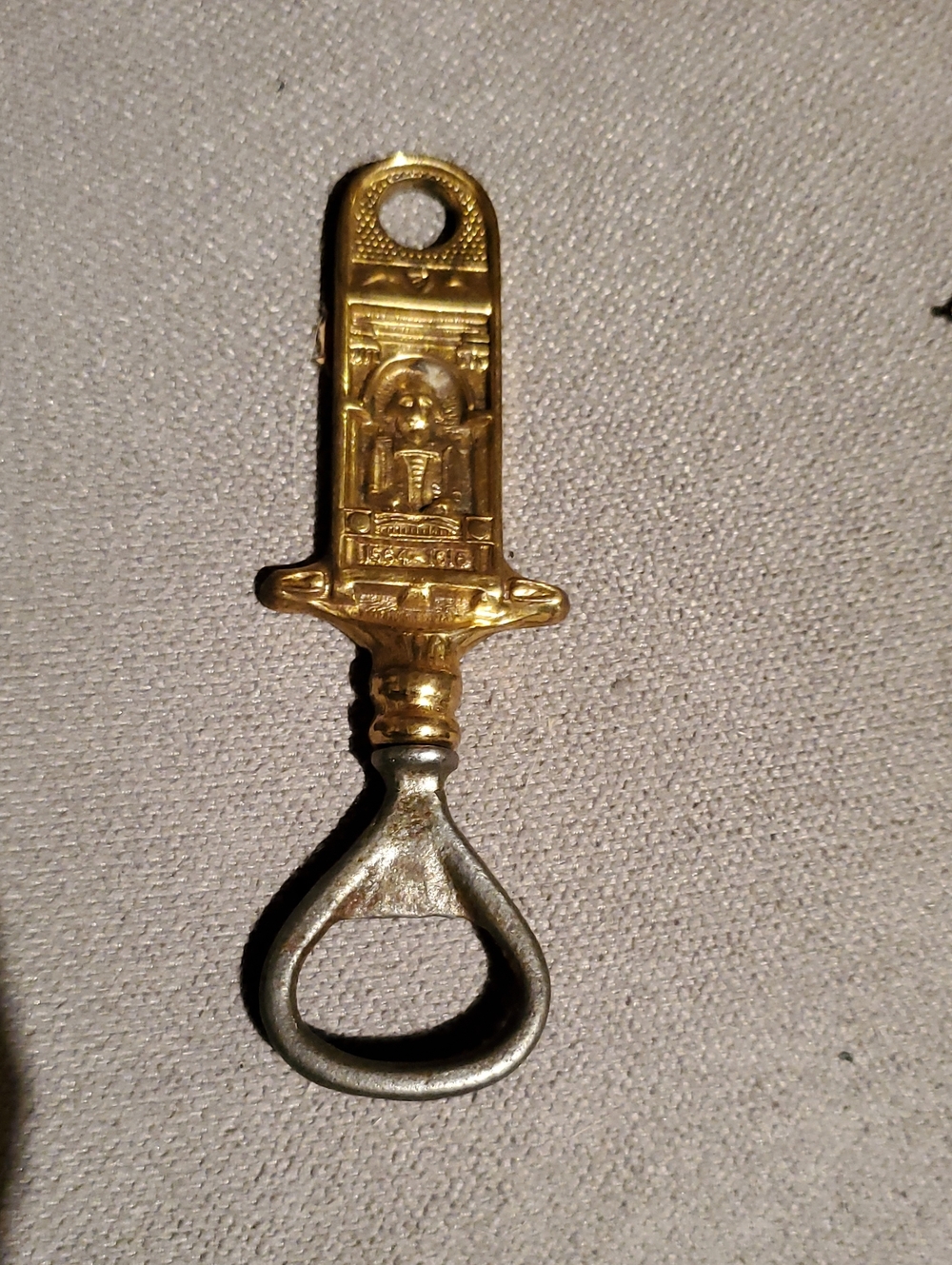 Vintage-Style Gold and Silver Bottle Opener - Shakespear 1930